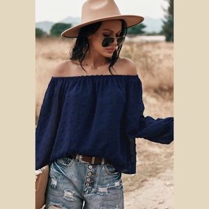 Navy off the shoulder flowy swiss dot blouse